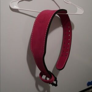 INAKA power pink lifting belt size medium.